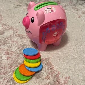 Educational Piggy Bank with Colorful Coins